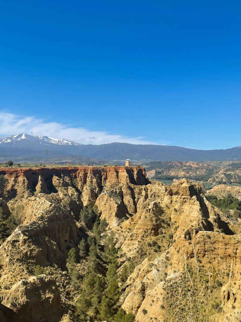 carcavas de marchal viewpoint from afar with mountain behind