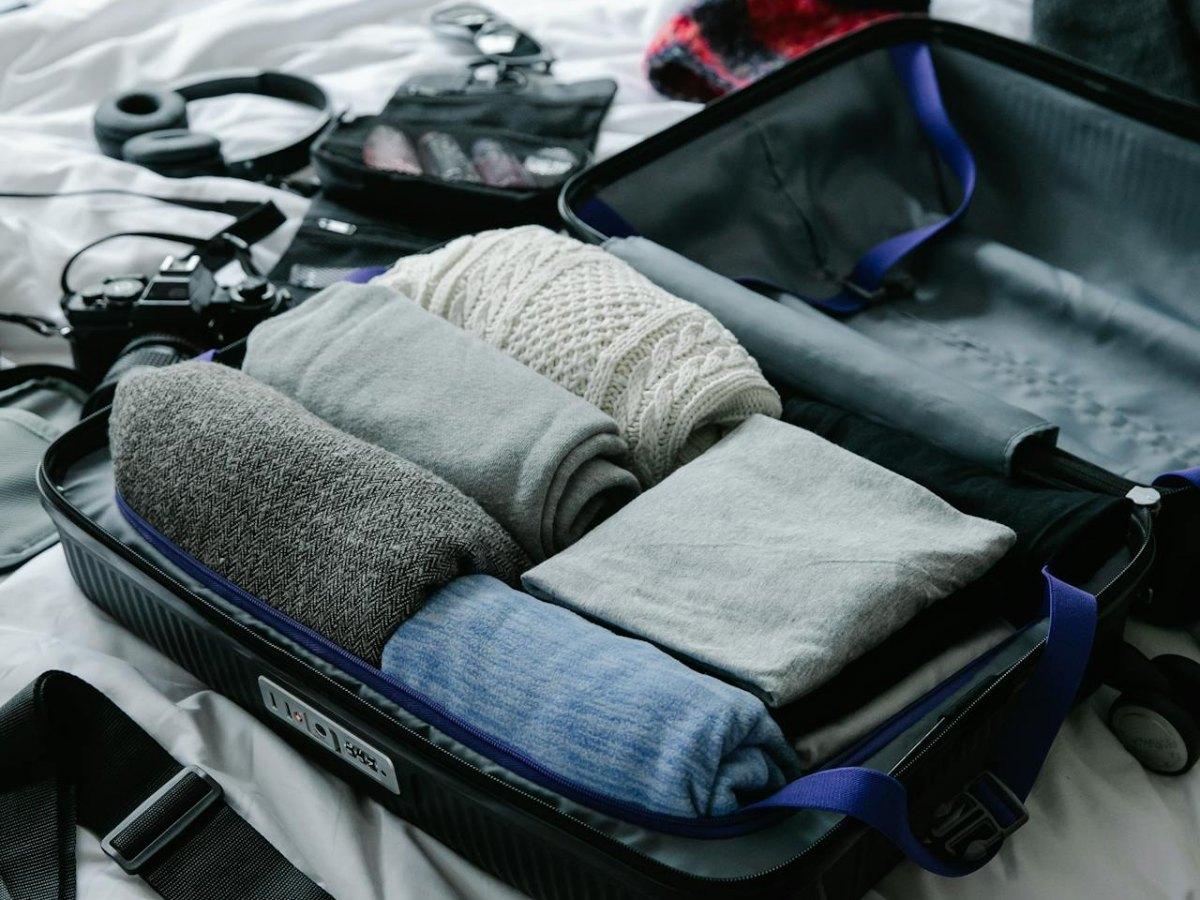 fall clothes in suitcase