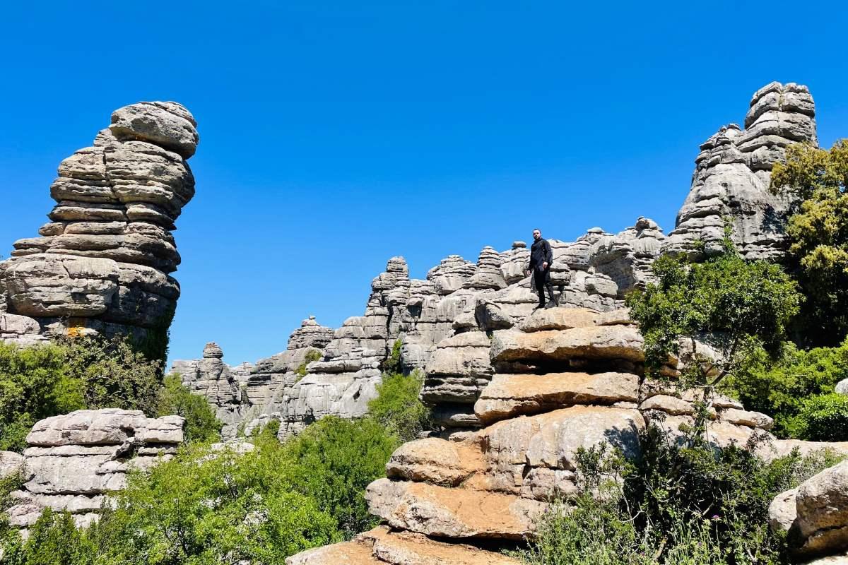 kev standing on huge rock formations