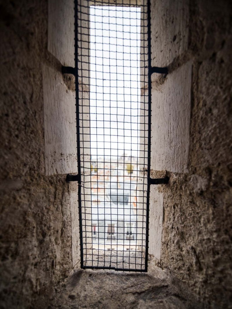 window inside notre dame towers stairs